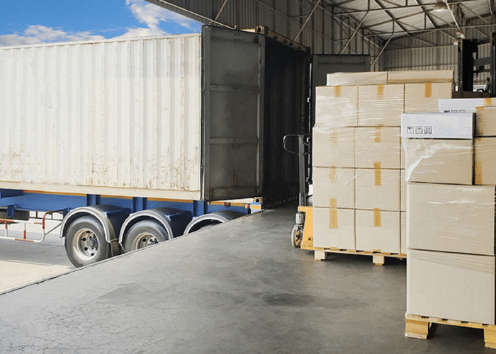 Transportation loading dock with commercial truck and cargo containers for safety assessment